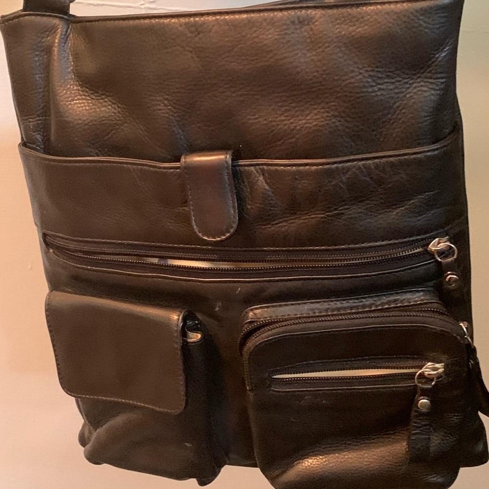 Bags. Blk crossbody. Multi-pockets Good condition. Will also include Coach bag